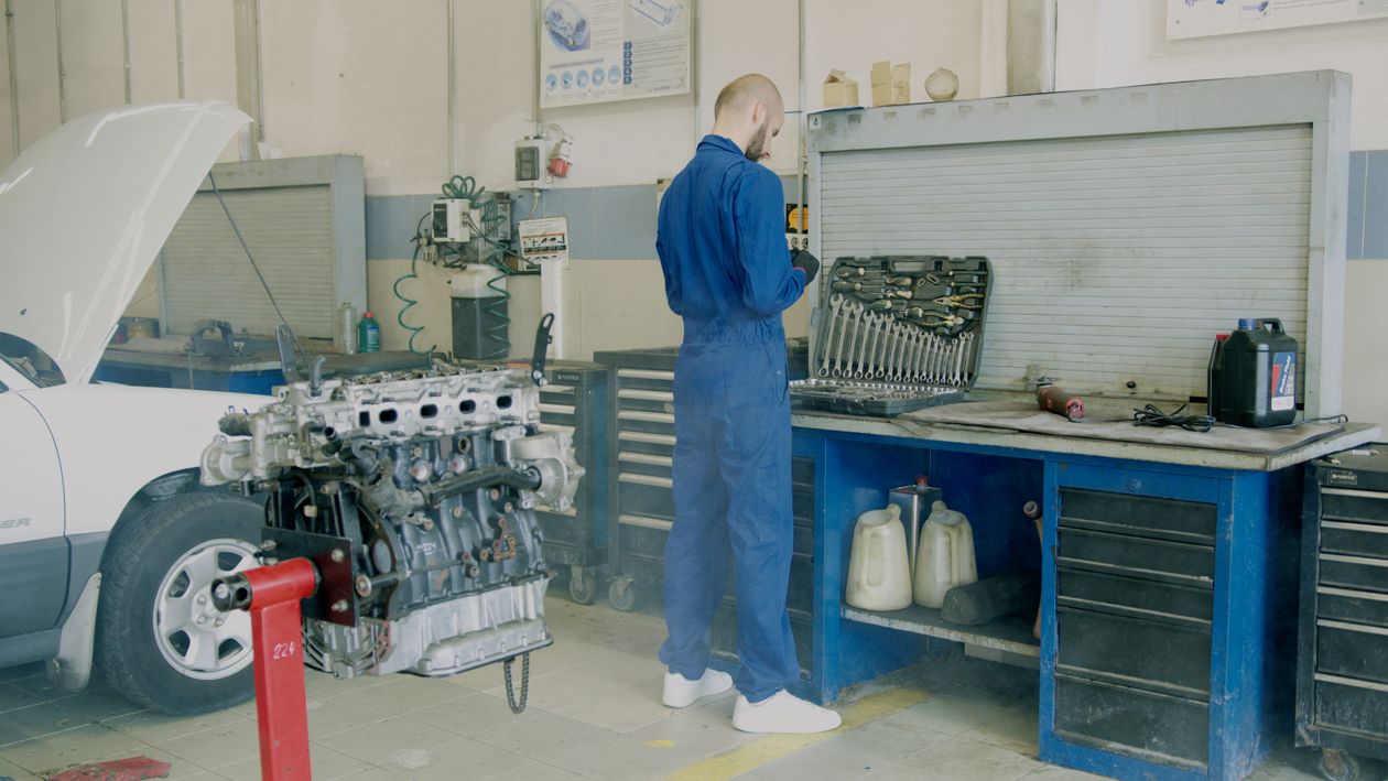 Mechanic selecting tools