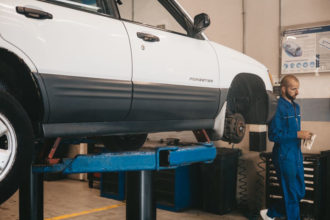 Car on lift being evaluated